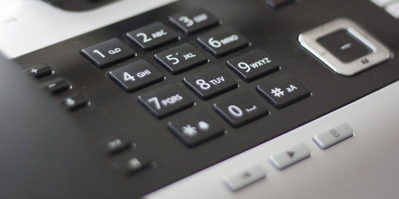 Closeup of a telephone keypad.